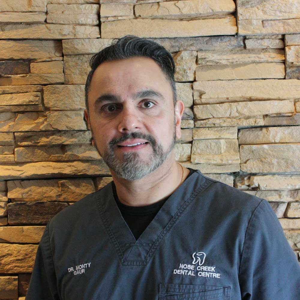 Dr. Monty Gaur Nose Creek Dental Dentist